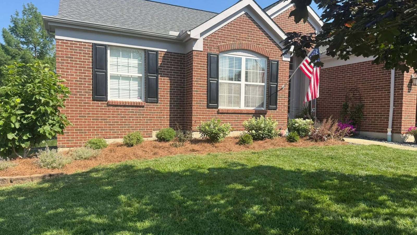 Front lawn and mulched beds maintained by Barth Contracting in Northern Kentucky