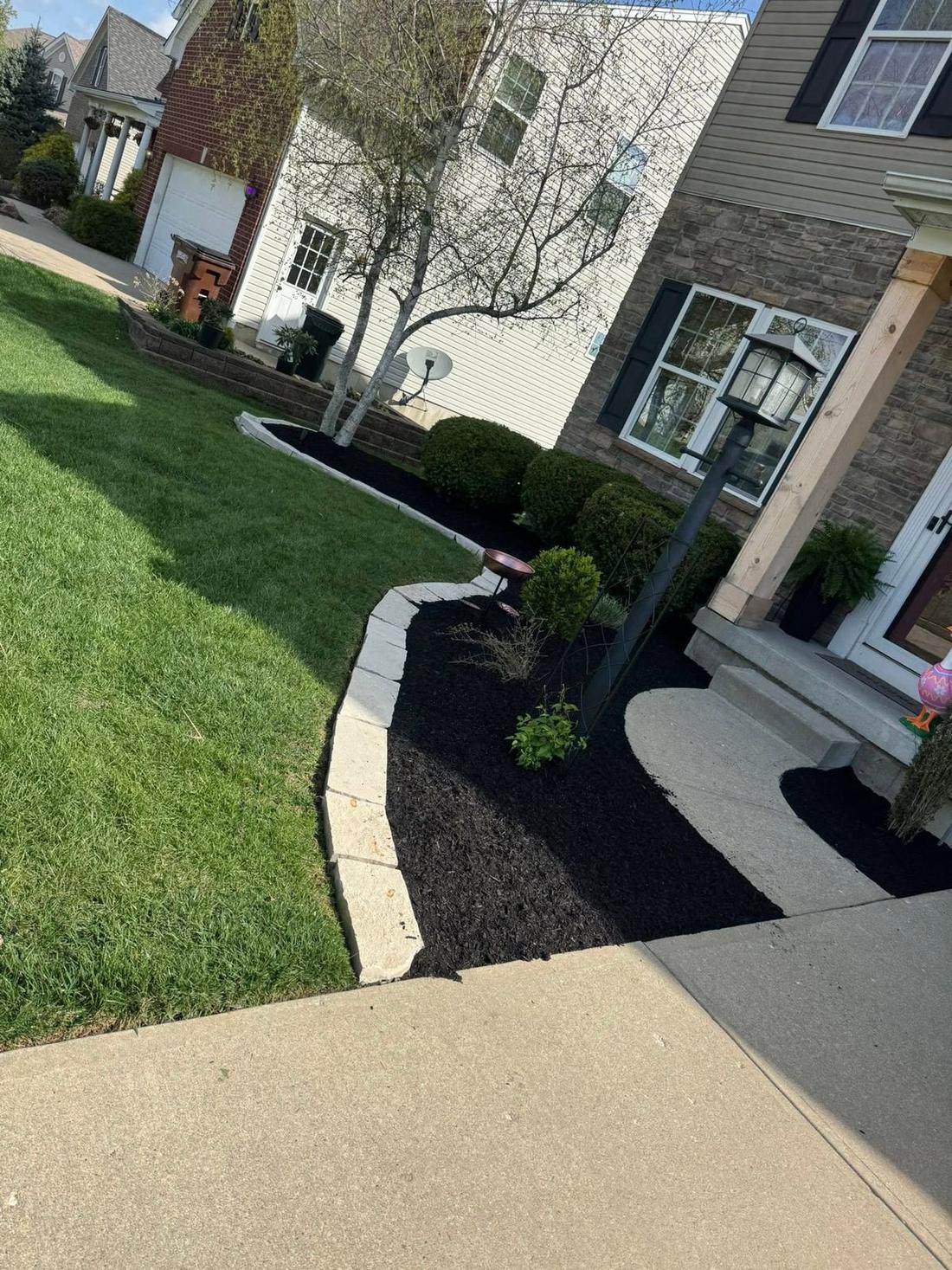 Mulch bed along the front walk